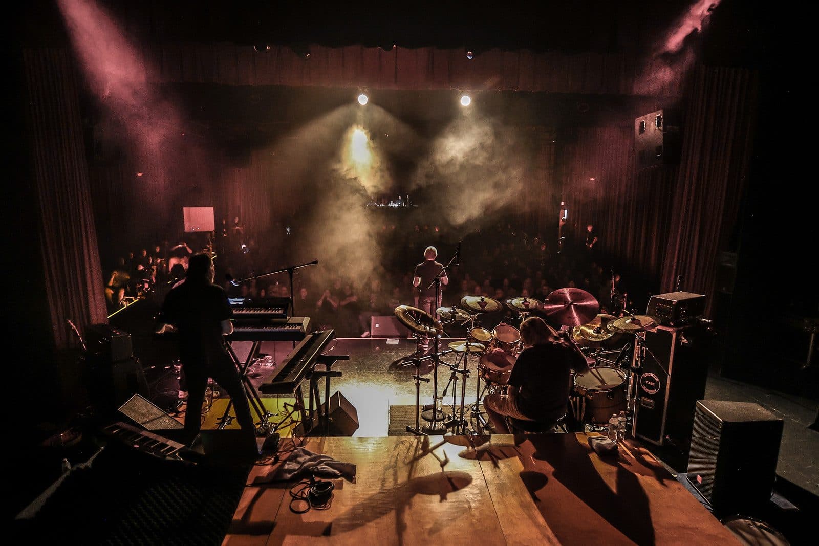 Overhead view of the Branson Meadows stage bathed in concert lighting and haze